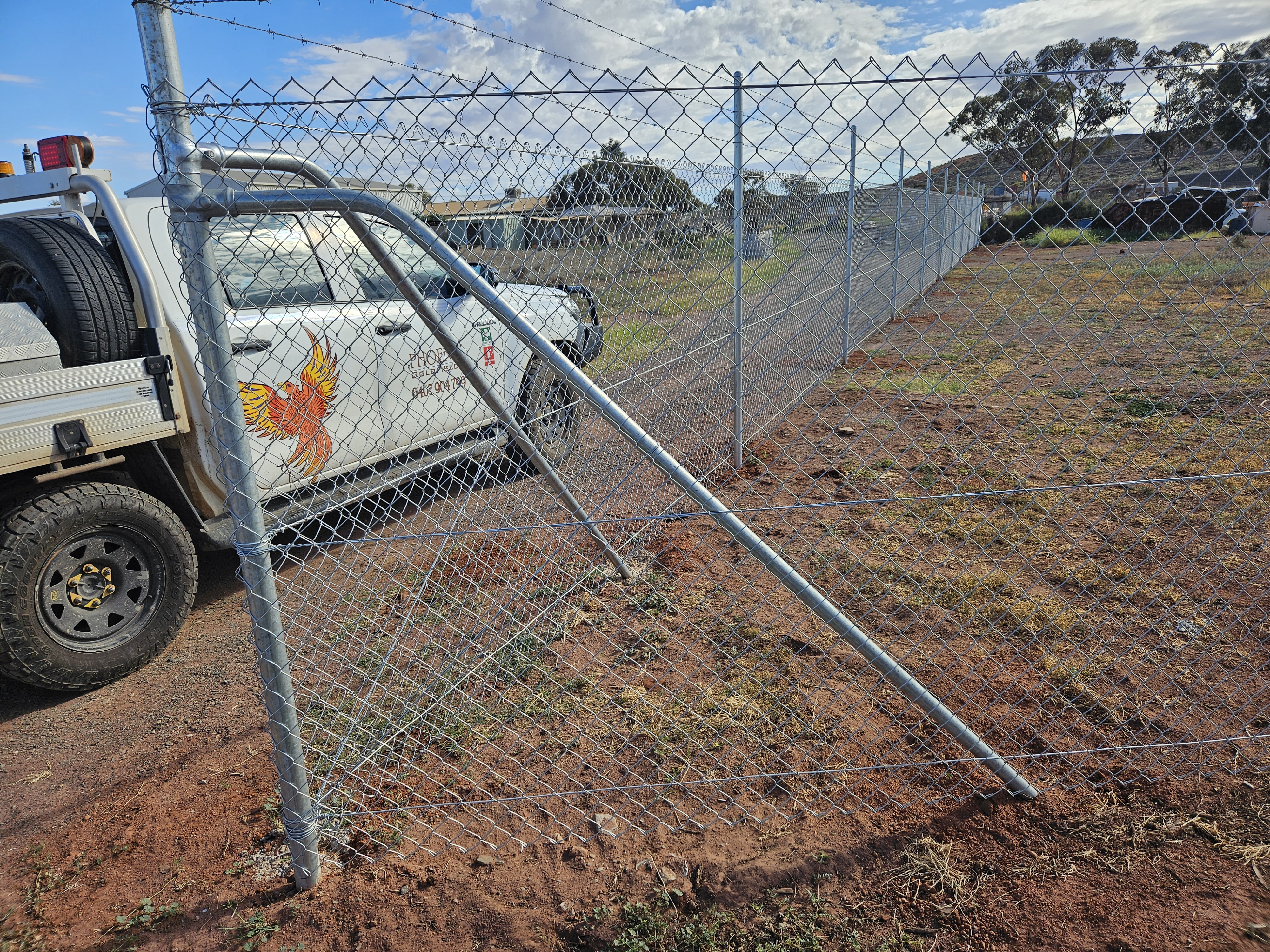 Chain link fence installation at rural property by Phoenix Goldfields Kalgoorlie